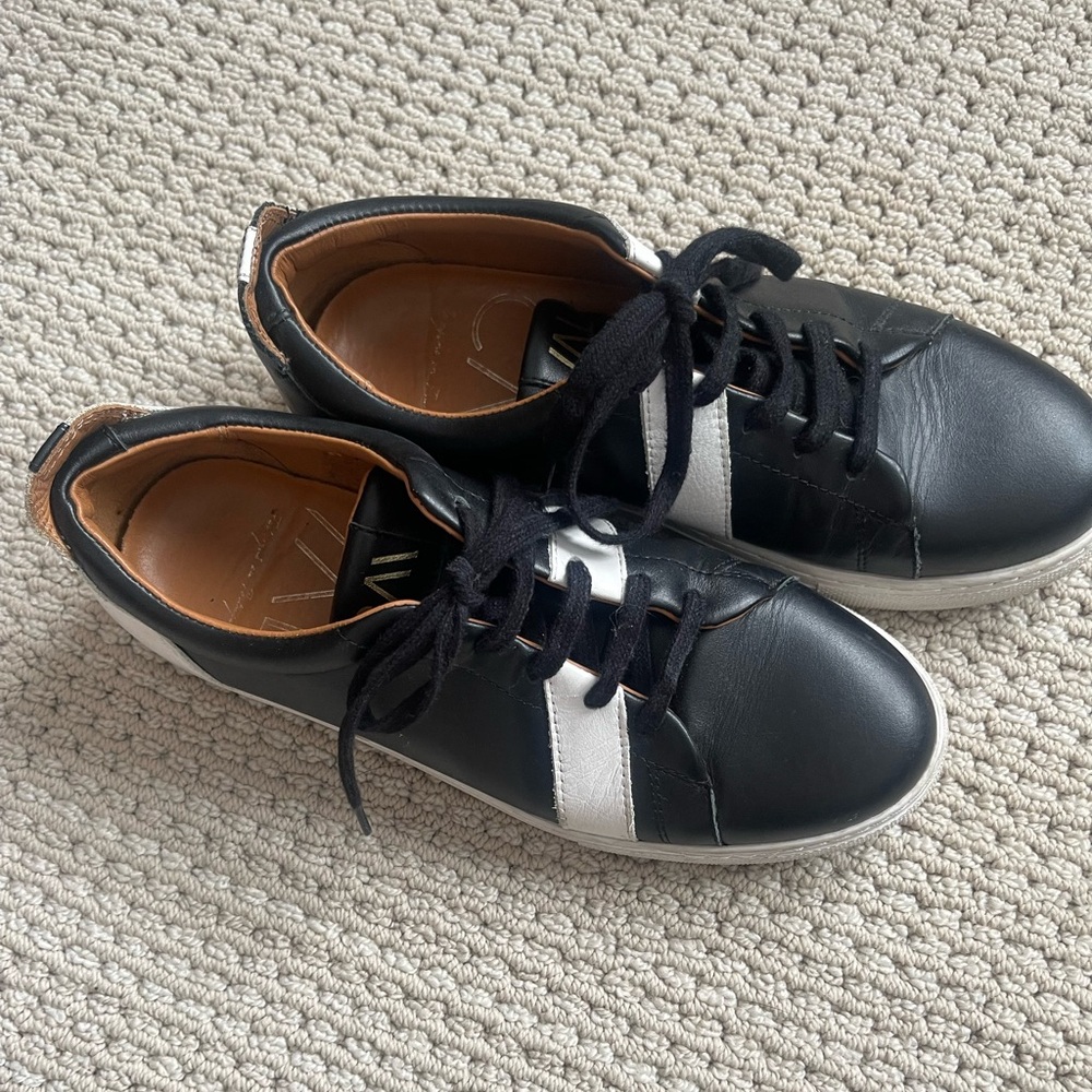 Black and white French tennies